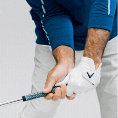 Golfer flipping at impact showing premature wrist unhinging