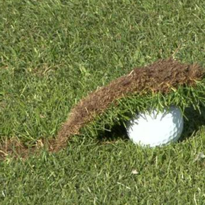 Fat golf shot strike pattern showing ground contact before ball