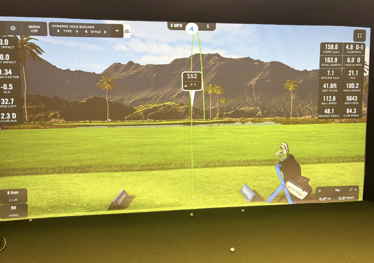 Golf simulator screen at ATX Golf Performance in Austin, Texas showing launch monitor data on a 152-yard 8-iron shot with carry distance, ball speed, club path, spin, and launch angle