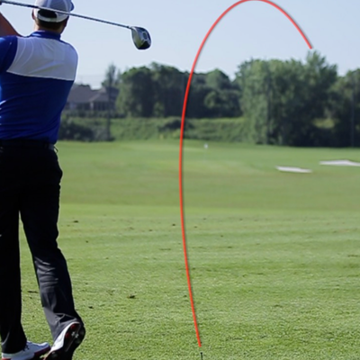 Golfer working on driver slice fix with launch monitor data overlay