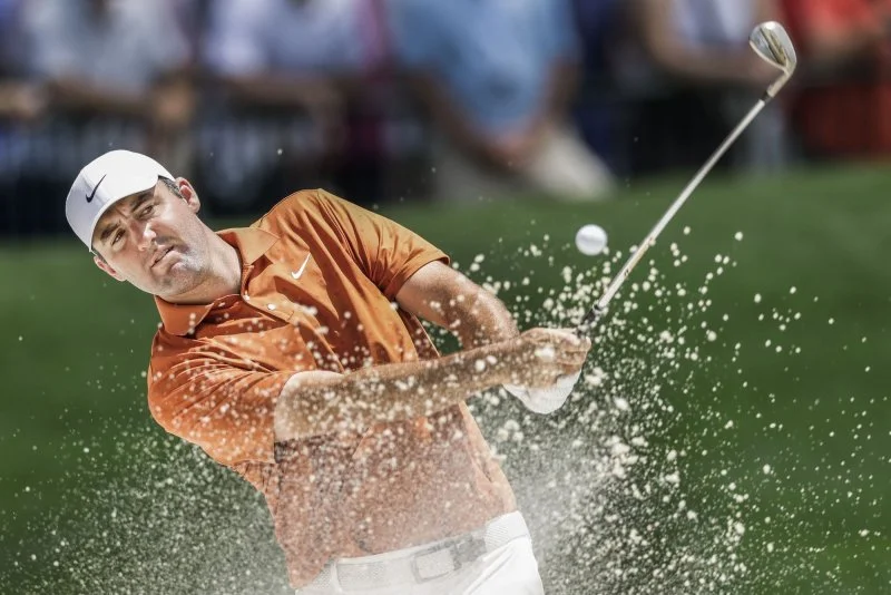 Scottie Scheffler bunker shot demonstrating presence and focus