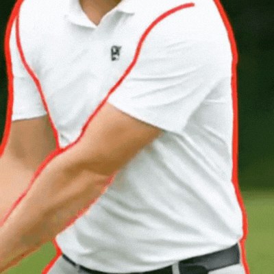 Golfer demonstrating left arm stretch and body separation in golf swing analysis